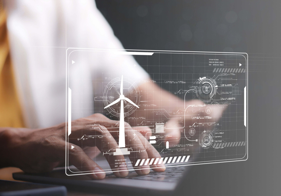 Digitale Darstellung Windrad erneuerbare Energien nachhaltige Energieberatung am Laptop