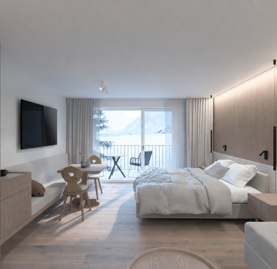 Modernes Appartementzimmer mit Doppelbett, Holzverkleidung, Sofa und Balkon mit Bergblick