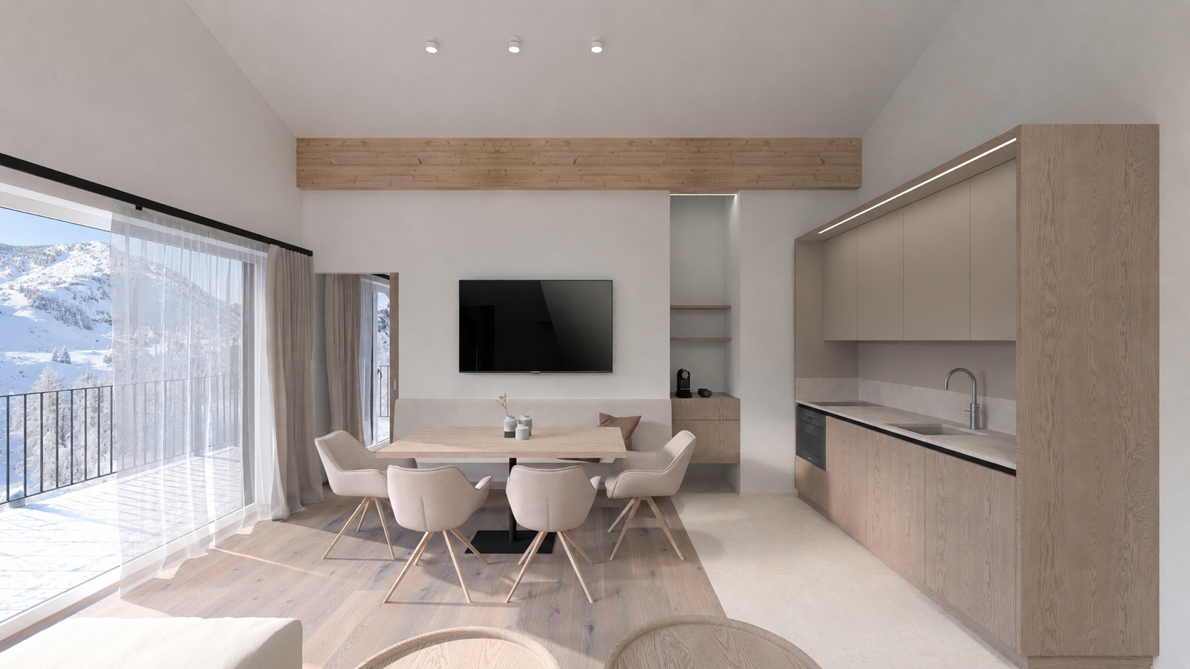 Modernes Appartement mit Essbereich, Küchenzeile und Balkonblick auf verschneite Berge