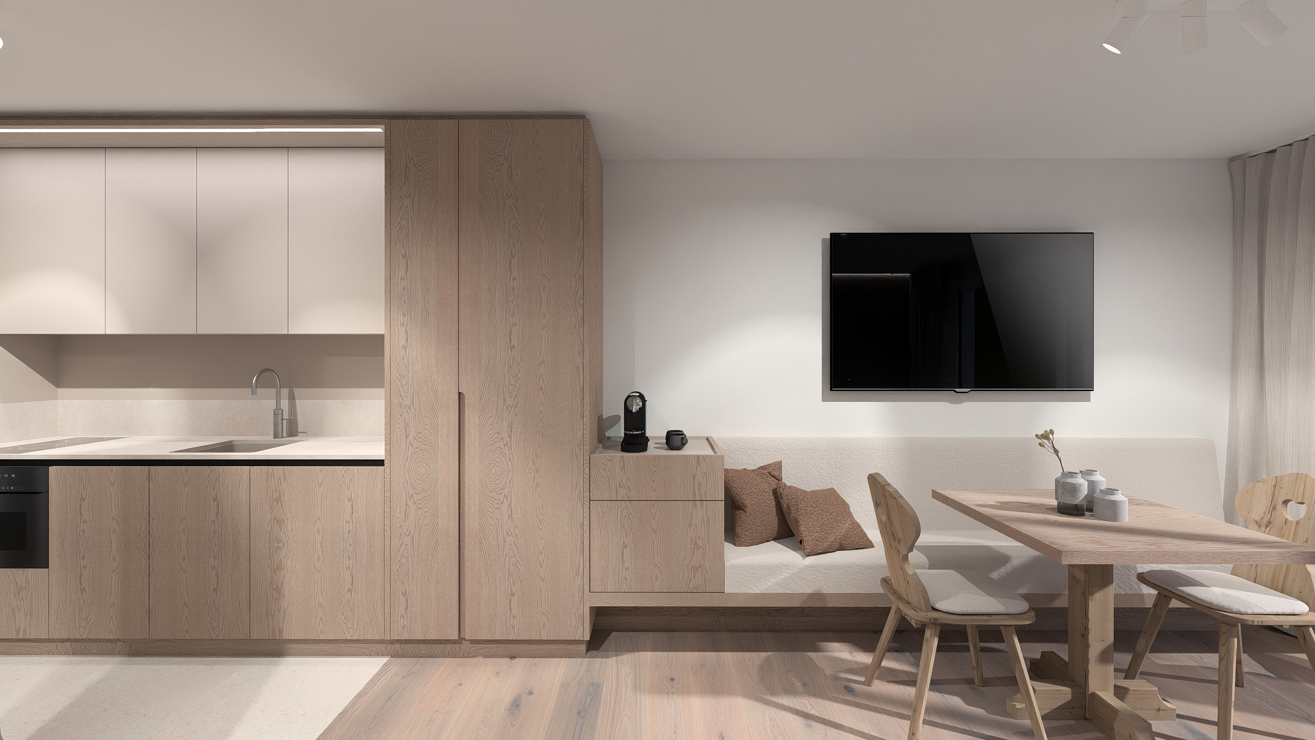 Moderne Wohnküche mit hellen Holzfronten, Esstisch, Sitzbank und Fernseher an der Wand
