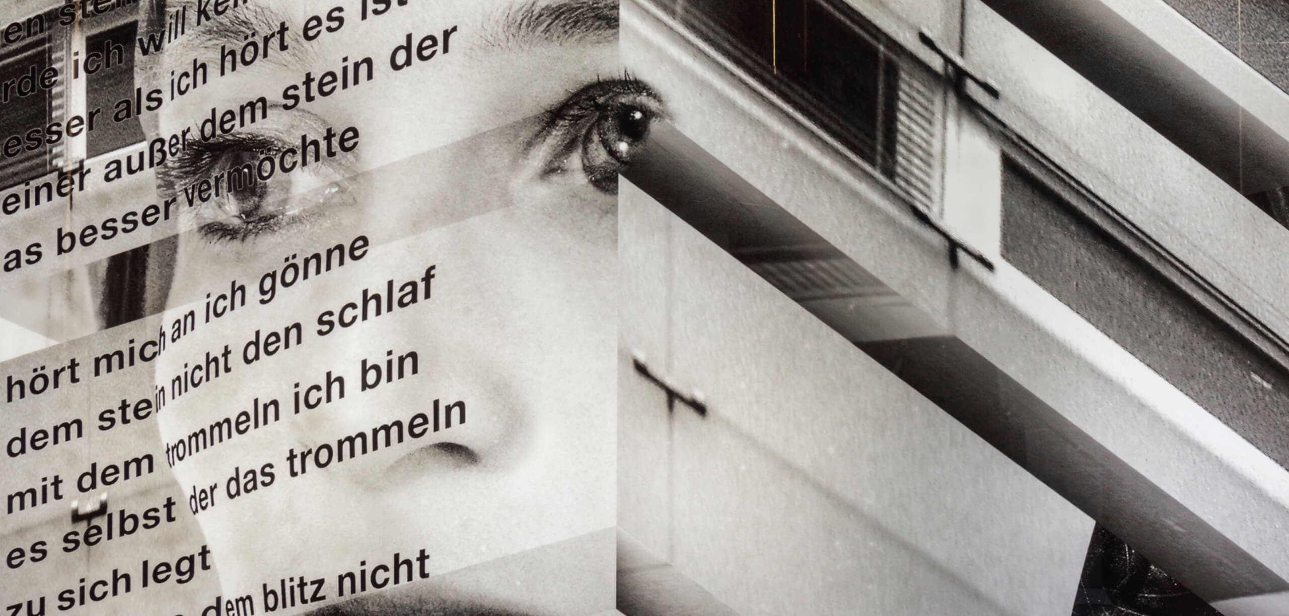 Künstlerische Collage mit Texten und Augenmotiv in urbanem Umfeld, Salzburg.